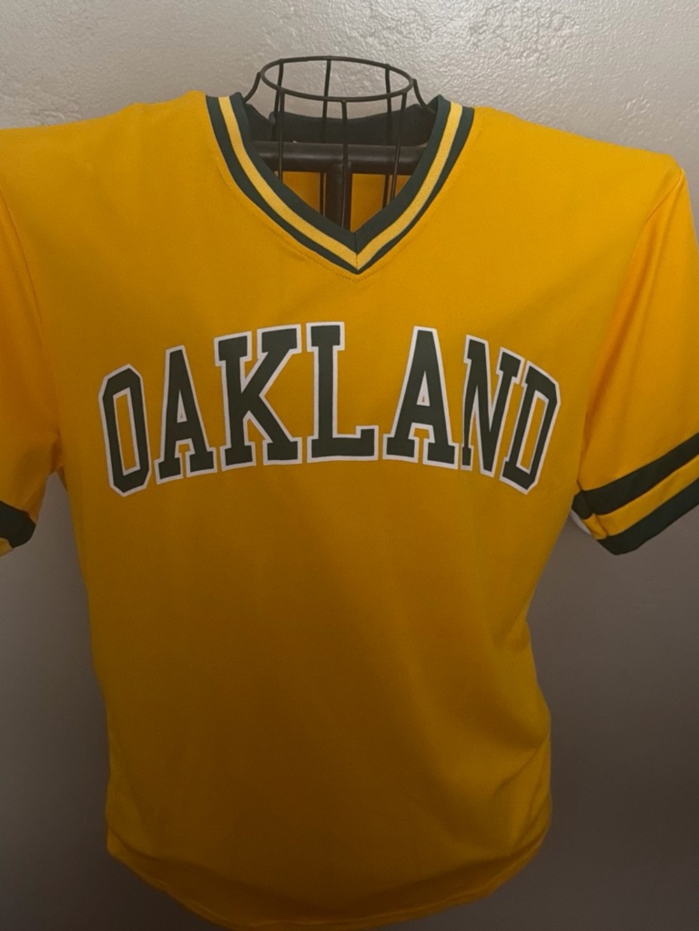 Oakland Youth Yellow V‑Neck Sports Jersey with Green Trim